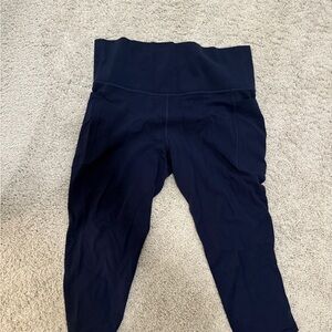 Athleta Salutation Stash Pocket Capri Navy Leggings